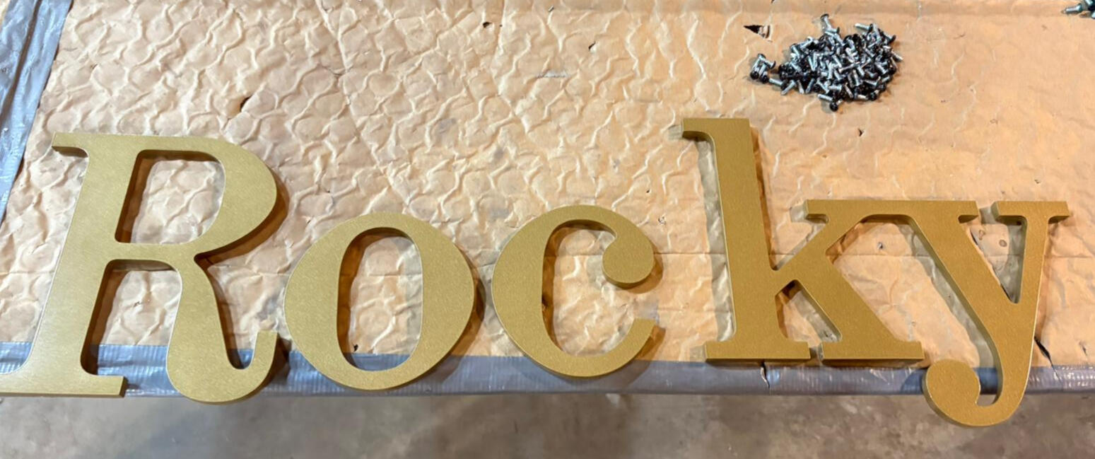 Router cutter and painted letters
